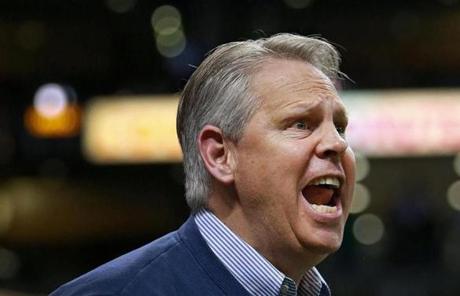 4/26/13: Boston, MA: Celtics president Danny Ainge leapt out of his seat and screamed at an officila, looking for a first quarter foul on the Knicks, but he didn't get it. The Boston Celtics hosted the New York Knicks in Game Three of an NBA Eastern Conference Quarter Final playoff series at the TD Garden. (Jim Davis/Globe Staff) section: sports topic: Celtics-Knicks

